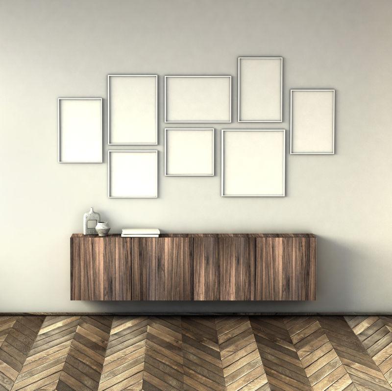 在浅灰色墙壁内饰背景上模仿海报框架