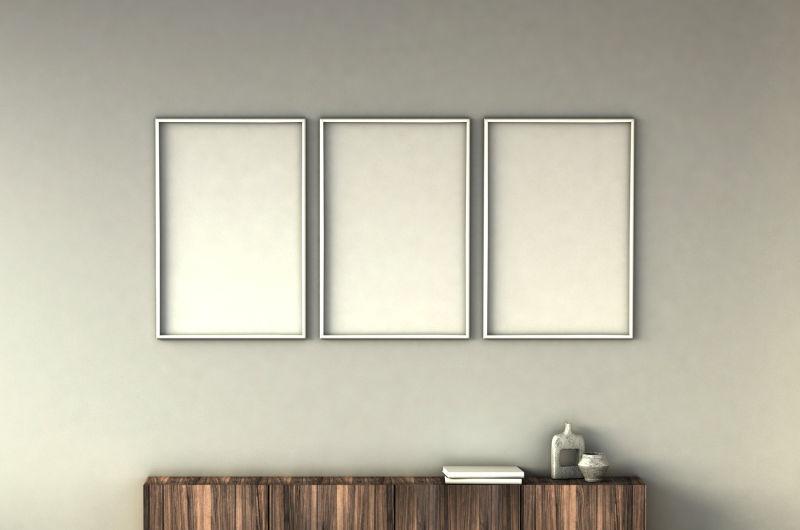 在浅灰色墙壁内饰背景上模仿海报框架图片构图概念