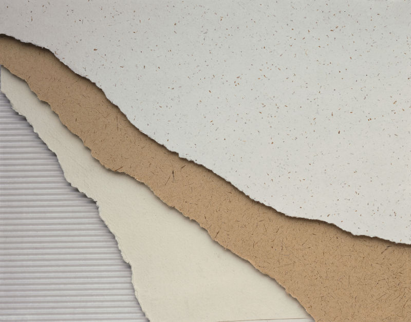 撕开的纸纹理背景