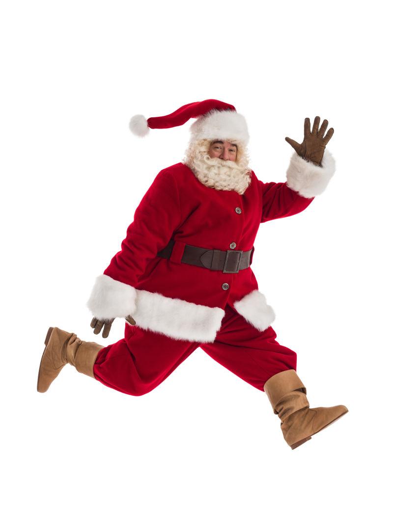 白色背景中跑步的圣诞老人