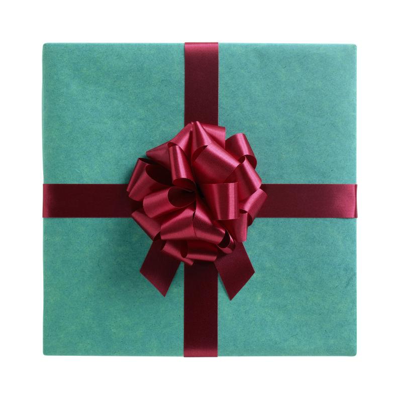 蓝绿色礼盒上的红色丝带