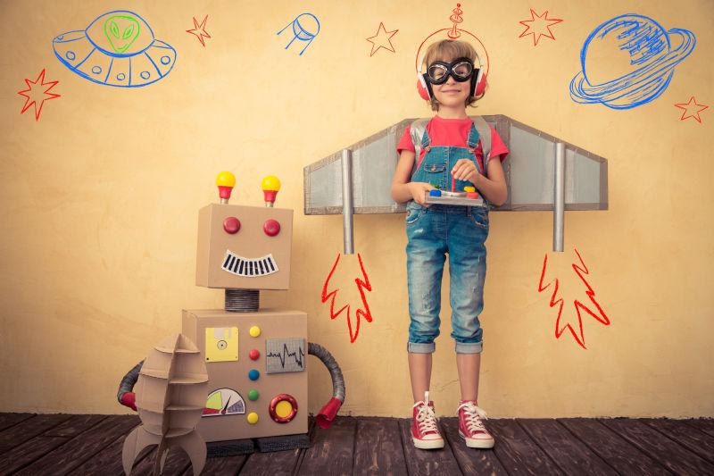 和玩具机器人玩耍的孩子