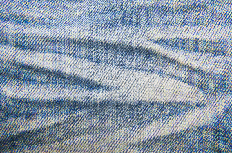 带接缝的浅蓝色牛仔织物