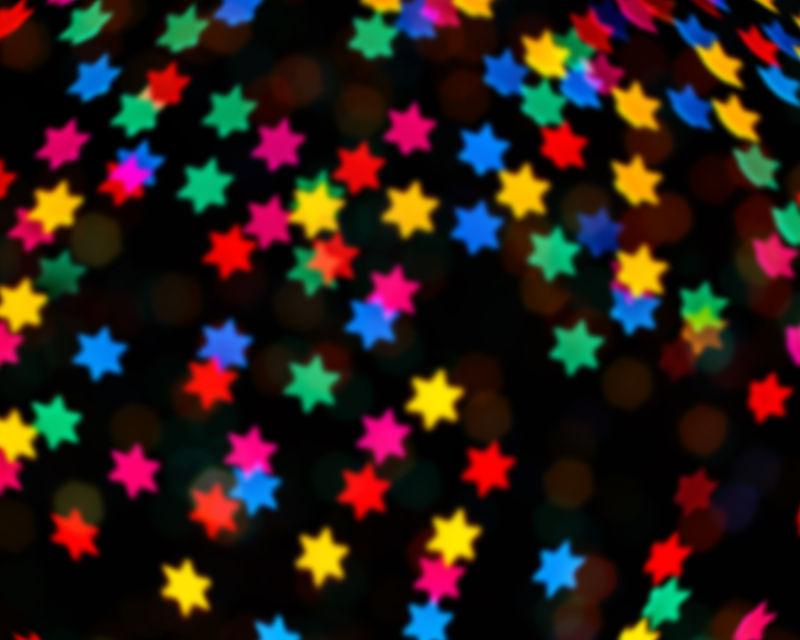 黑色背景上各种颜色的六角形