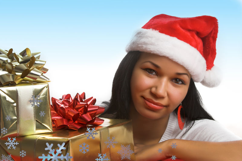 戴圣诞帽的美女与礼物