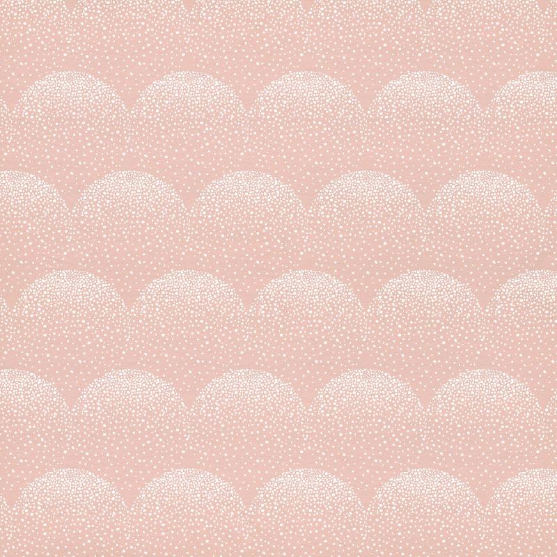 粉色纸张上拼成鱼鳞状的白色圆点