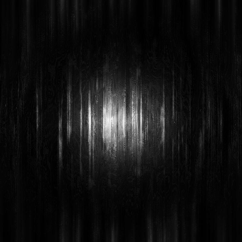 黑暗中灯光照射下的木板背景