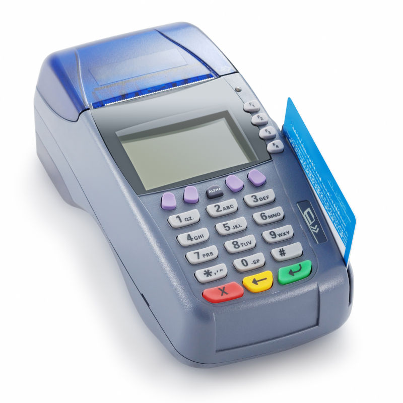 插着一张信用卡的银行终端刷卡机