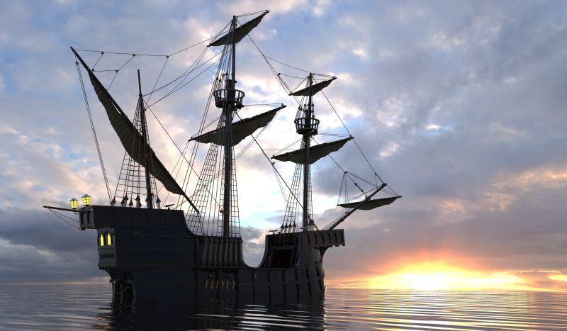 夕阳海平面上的帆船