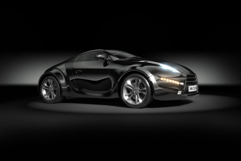 侧面拍摄的开灯跑车