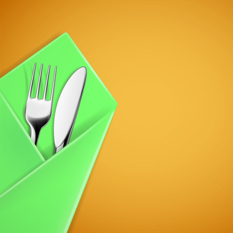 矢量绿色餐具里的刀叉