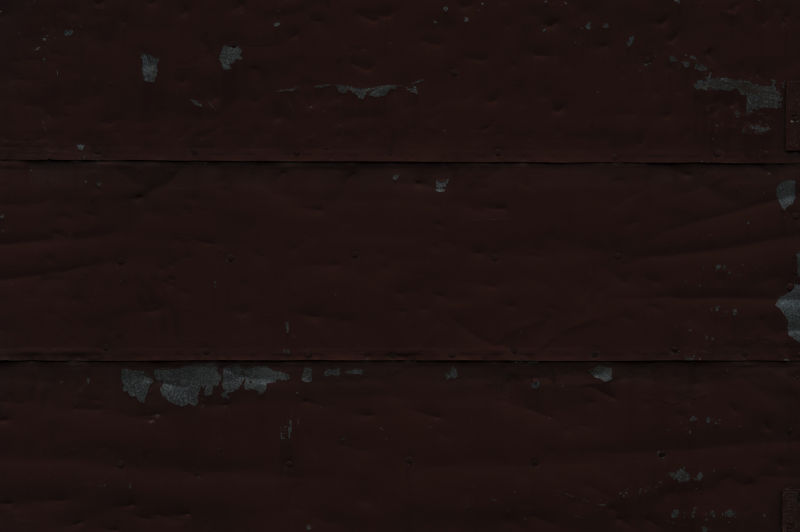 老旧金属纹理背景上脱落的油漆