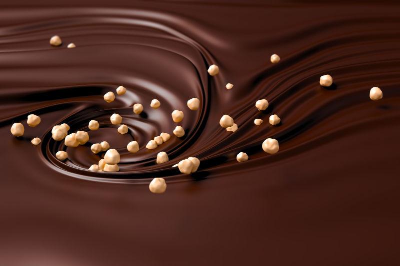巧克力漩涡背景下的白巧克力豆
