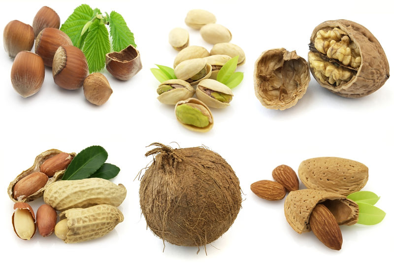 白色背景上不同的六种坚果