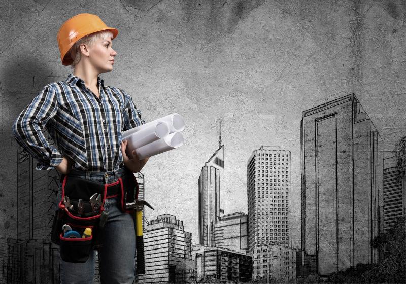 城市背景前拿着文件的建筑师