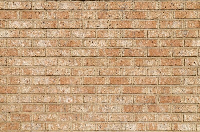 旧纹理的红色石头块特写