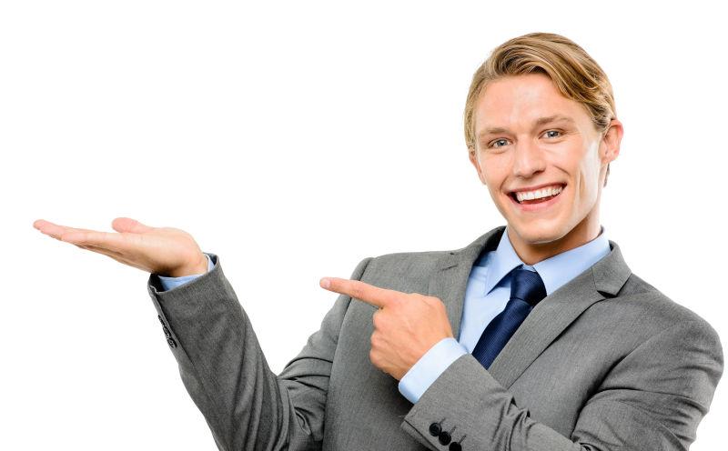 快乐的商人指着白色背景
