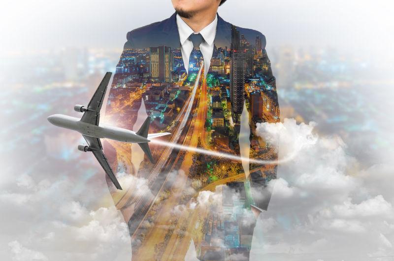 摩天大楼背景下的飞机和商人的双重曝光