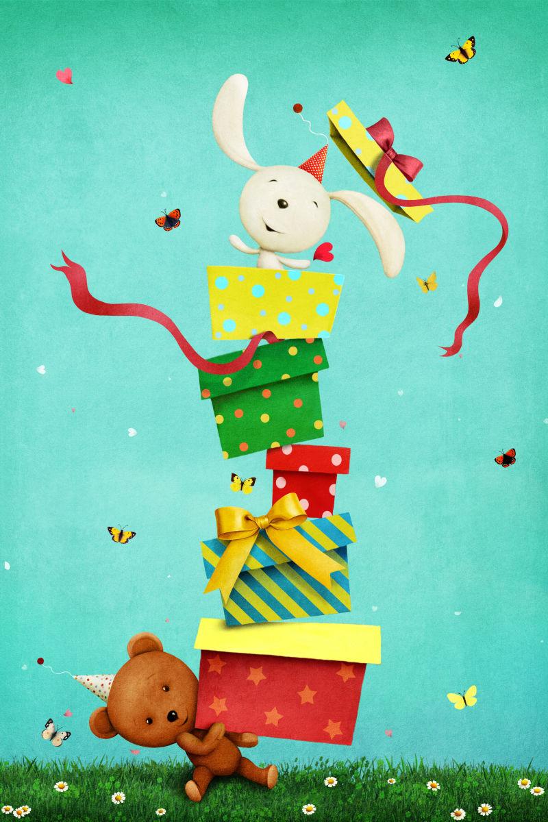 小熊端着的礼物盒的最上面有一只可爱的兔子