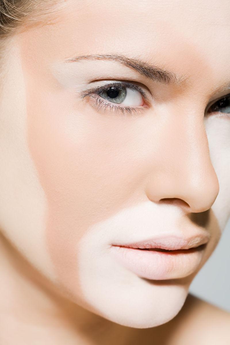 脸上不同化妆品颜色的美女