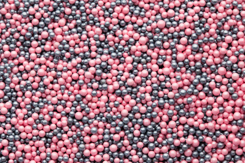 灰色和粉色的甜糖球