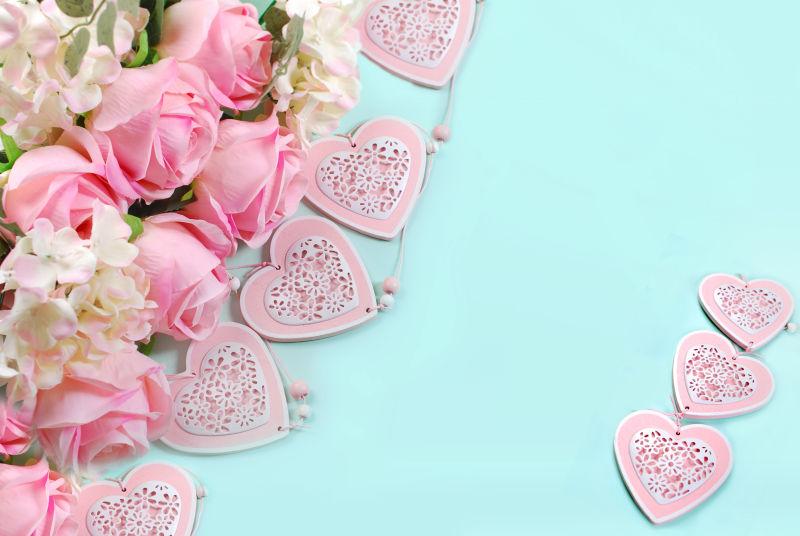 粉色玫瑰和红心的浪漫色彩背景