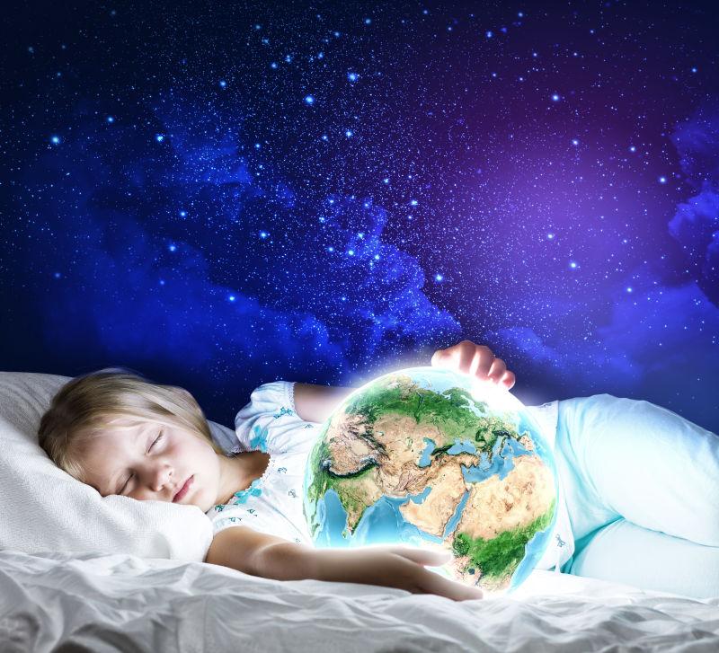 怀抱地球入睡的小女孩