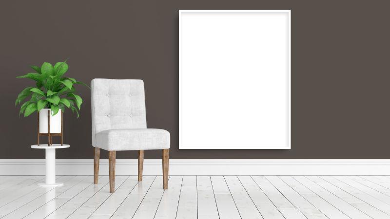 棕色背景下的空白框架和木地板上绿植旁的沙发