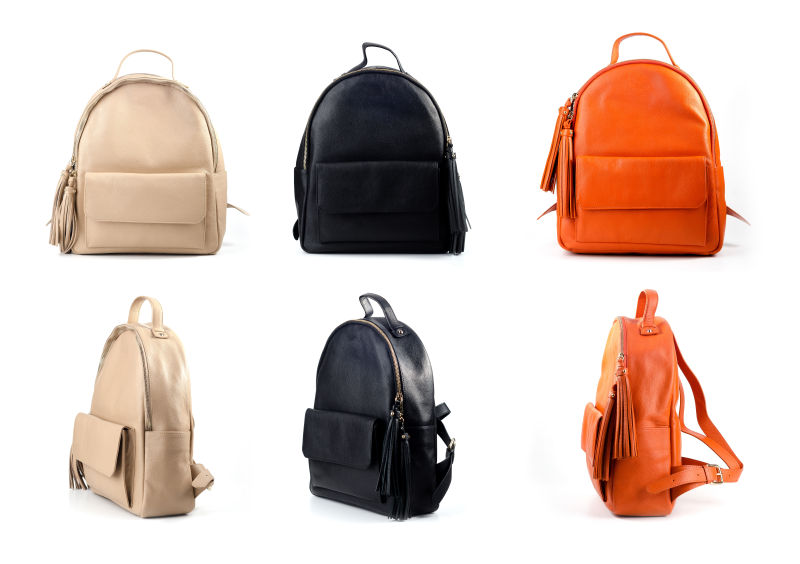 白色背景下的女性皮革背包