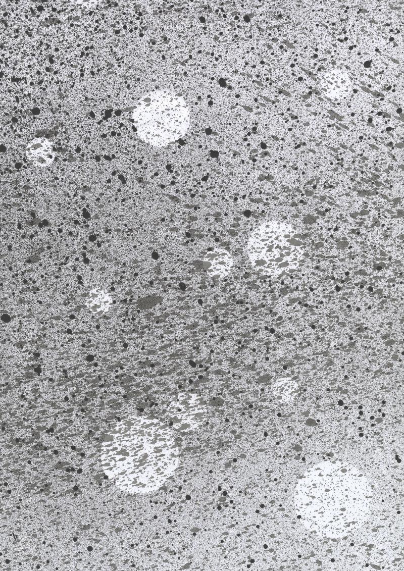 混凝土上的不同大小圆点背景