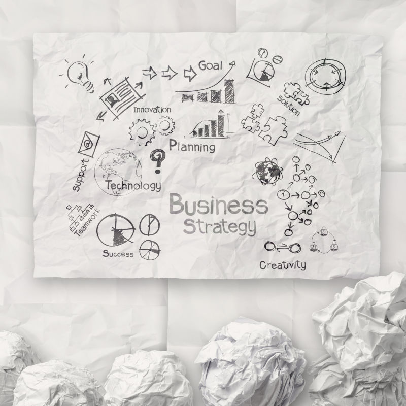 以废纸背景为创意的手绘创意经营策略