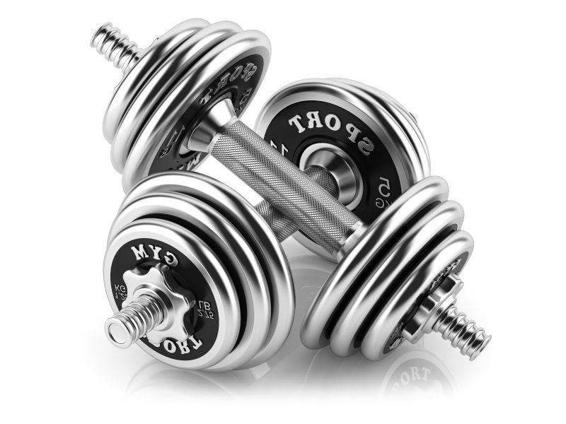 白色背景下的钢哑铃组