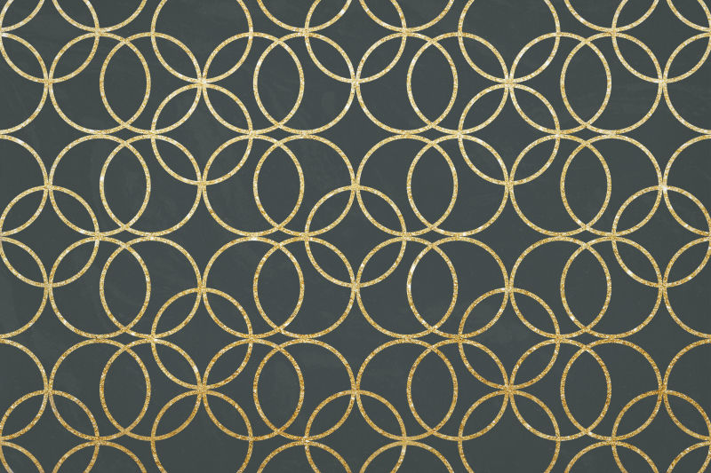 黑色背景上的金色圆圈的图案