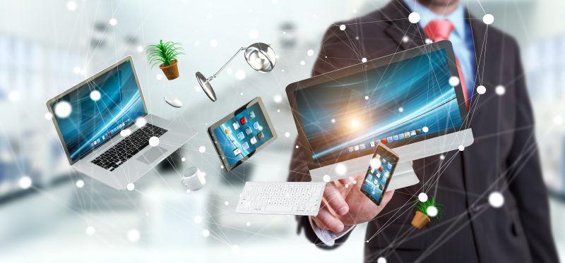 笔记本和手机平板飞出商人的手中