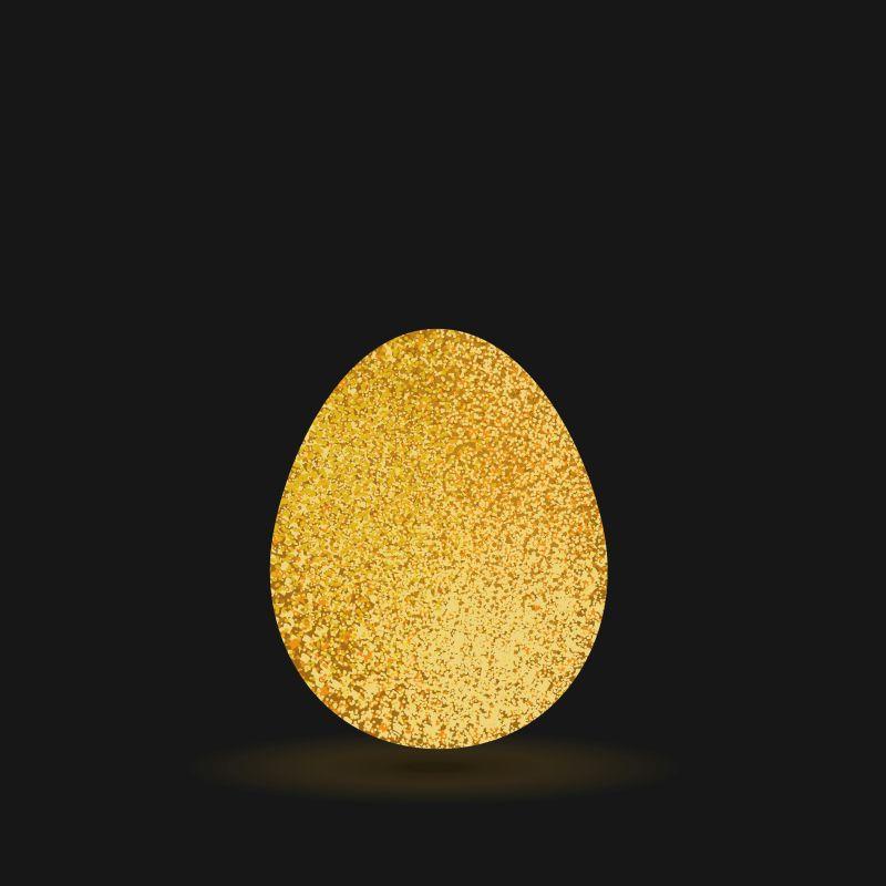 金蛋在黑色背景下闪闪发光