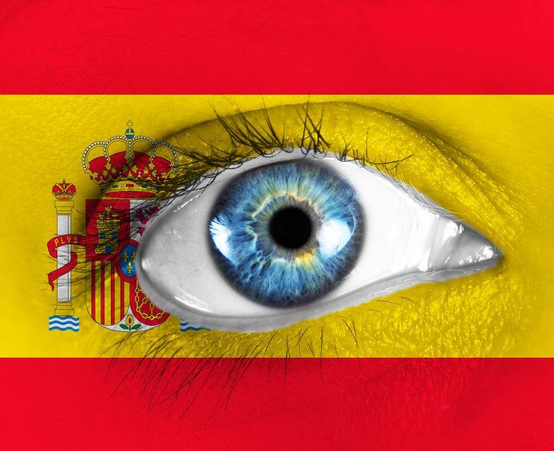 红色和黄色条纹里的蓝色眼睛创意