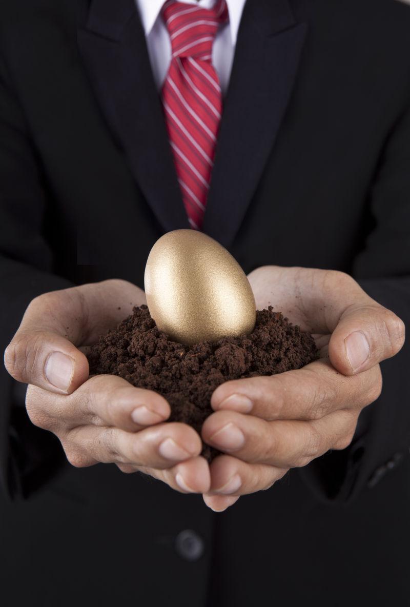 商人捧金蛋和土投资理念