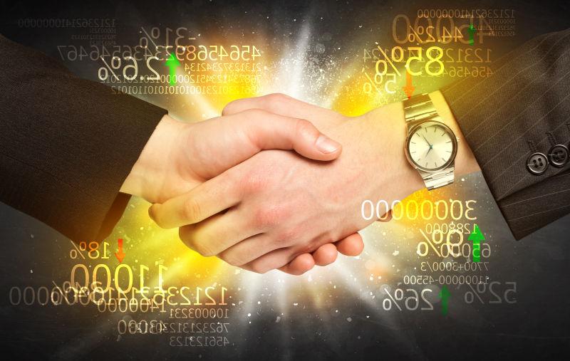 两个握手的男性商人