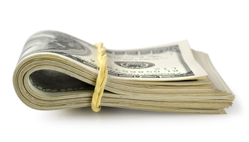 白色背景下的美元现金