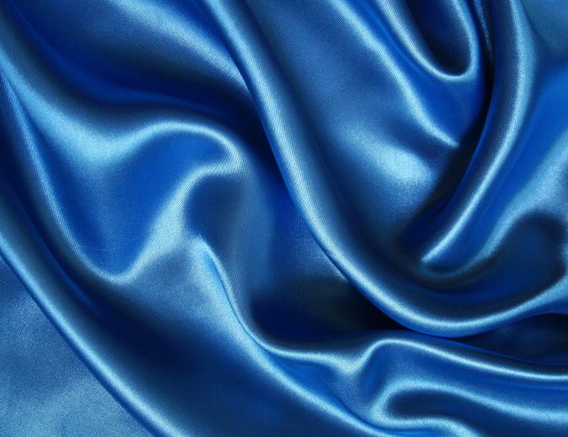 光滑优雅的蓝色丝绸背景