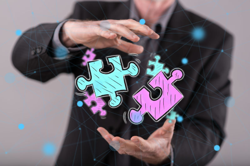 商人手中的拼图