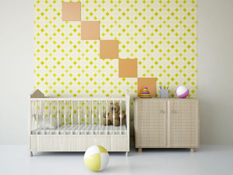 放着婴儿床和玩具的房间