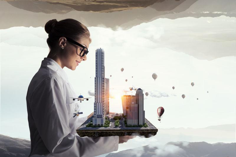 年轻的工程师在施工项目的手工艺模型