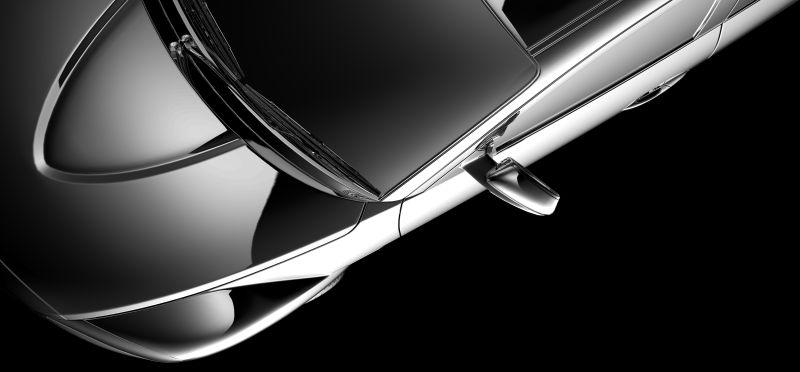 黑色背景上的黑色轿车模型