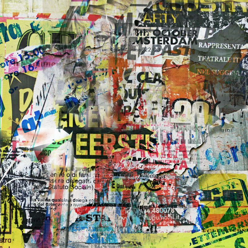 垃圾背景中的破旧海报