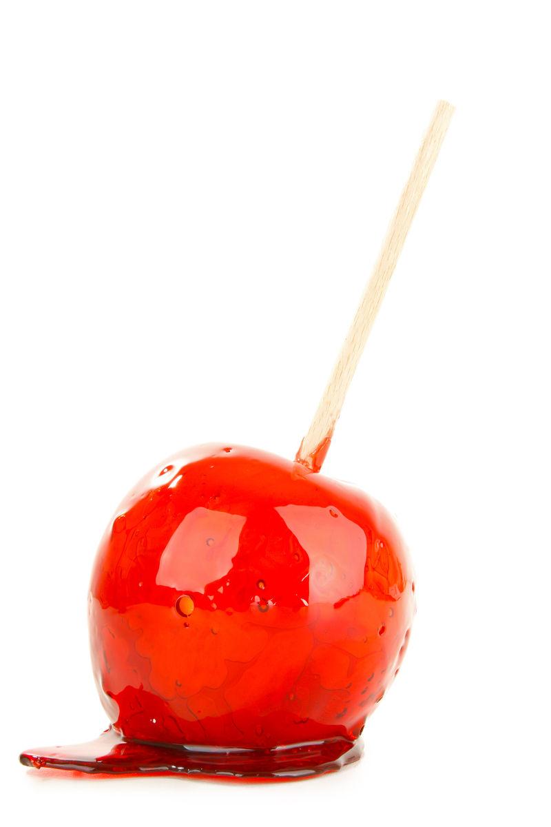 白色背景上的红色番茄糖果