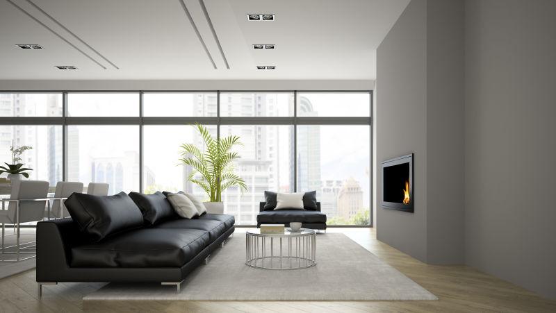 现代阁楼内壁炉与黑色沙发