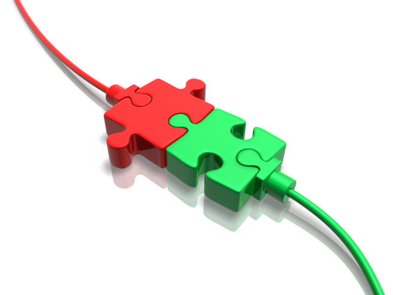 白色背景上拼图概念的插头