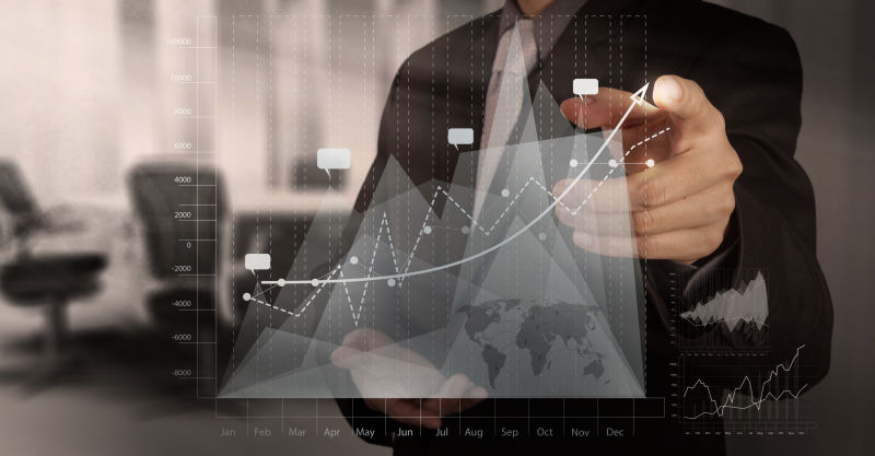 虚拟折线图和穿西装的商人