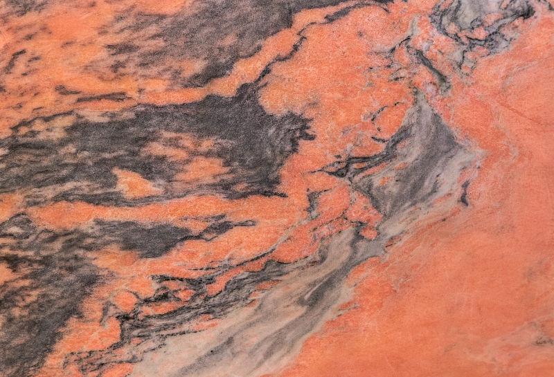 红色大理石表面的抽象纹理
